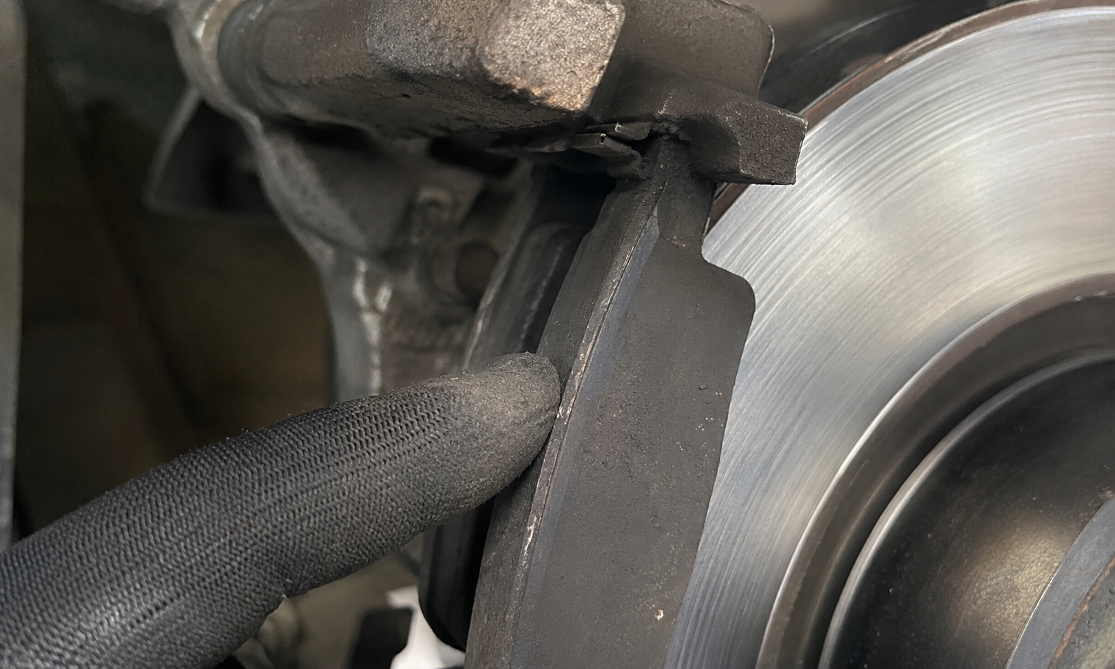Front brake pads, worn to 2mm